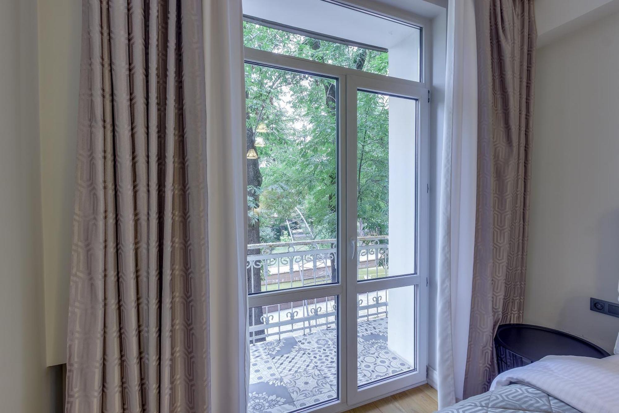 Opera Apartments Almati Szoba fotó